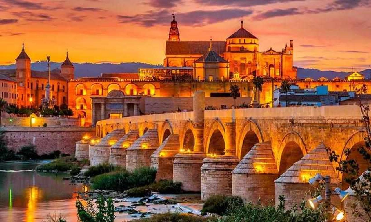 Puente Romano y Córdoba al atardecer